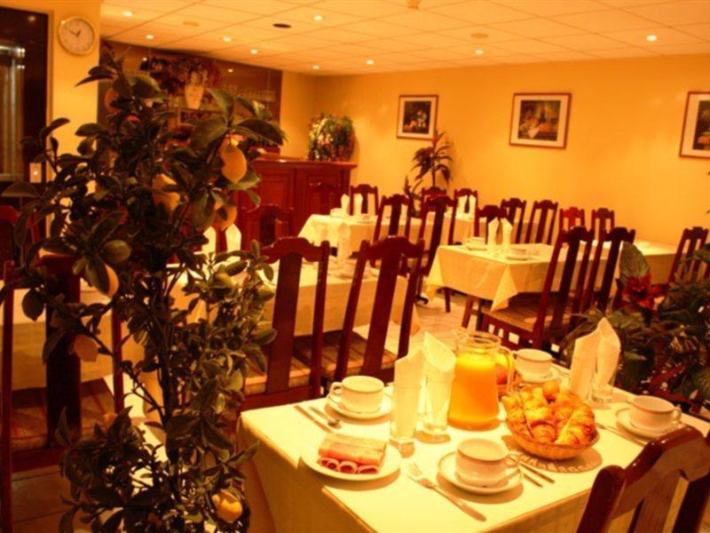 Belta Hotel París Restaurante foto